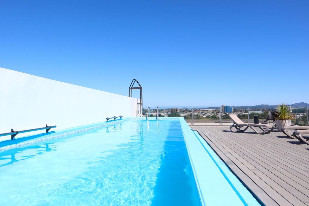 Wyndham Concepcion Pettra Hotell Eksteriør bilde Rooftop pool