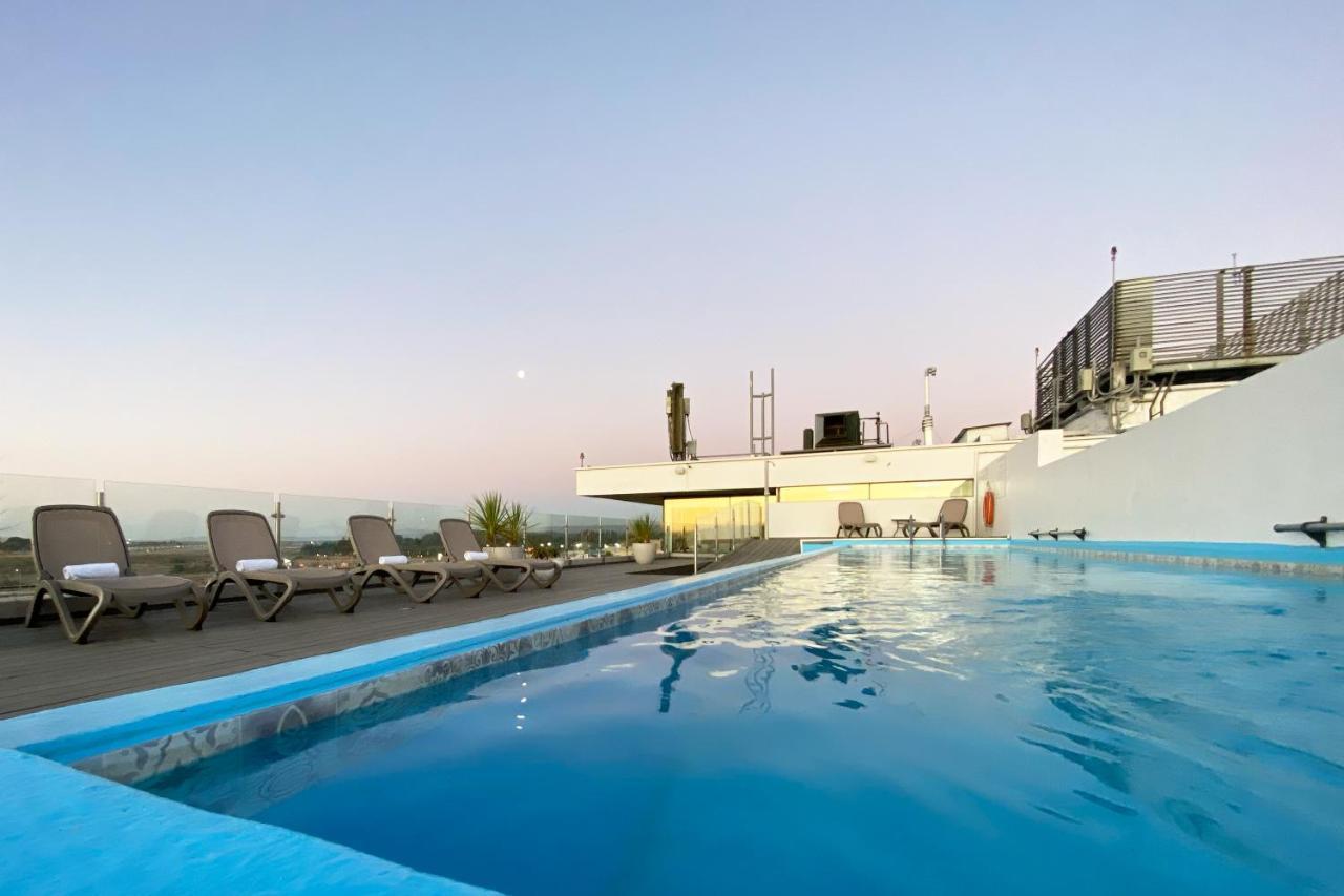 Wyndham Concepcion Pettra Hotell Eksteriør bilde Rooftop pool